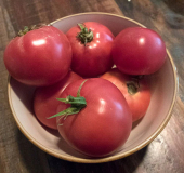 A picture of Eva Purple Ball heirloom tomato.